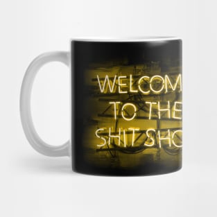 Welcome to the Shit Show in glowing yellow text sign Mug